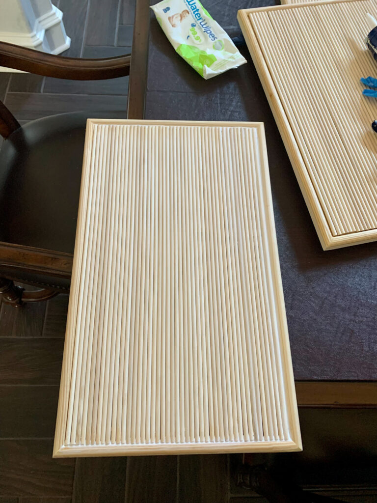 Reeded cabinet look with dowels