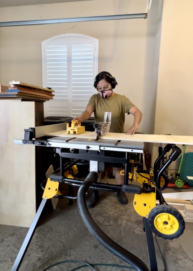 Cutting plywood pieces on table saw