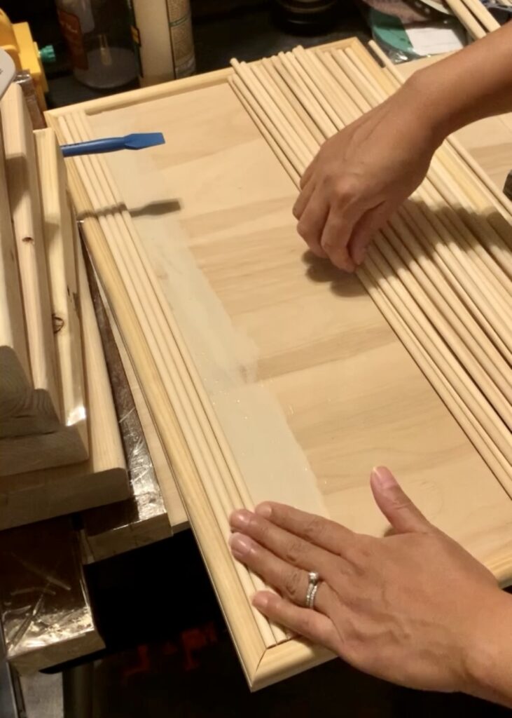 Gluing dowels on cabinet fronts