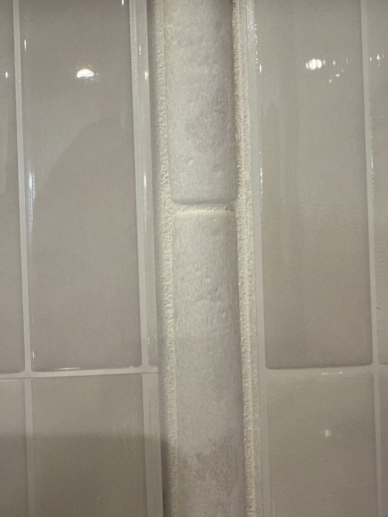 Close-up of peel and stick tile edge