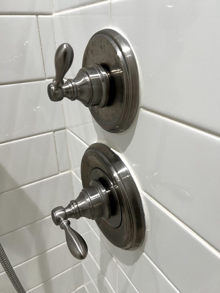 Shower fixtures, shower valves, satin nickel shower valves